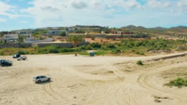 EL TULE LOS CABOS BCS MEXICO-2022: Vehicles Navigating a Sandy Construction Site