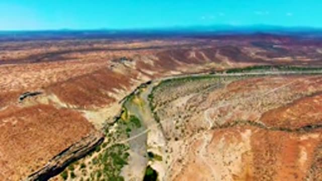 SAN JUANICO BCS MEXICO-2022: Winding River Through Arid Desert Landscape