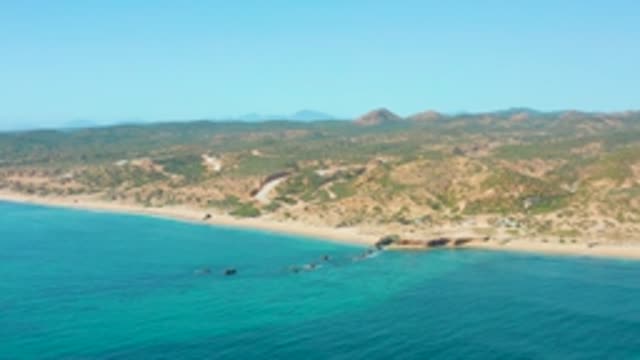 EL TULE LOS CABOS BCS MEXICO-2022: Coastal Beach with Clear Turquoise Water and Rolling Hills
