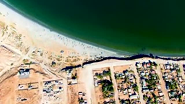 SAN JUANICO BCS MEXICO-2022: Beachgoers on Sandy Shore, Aerial View