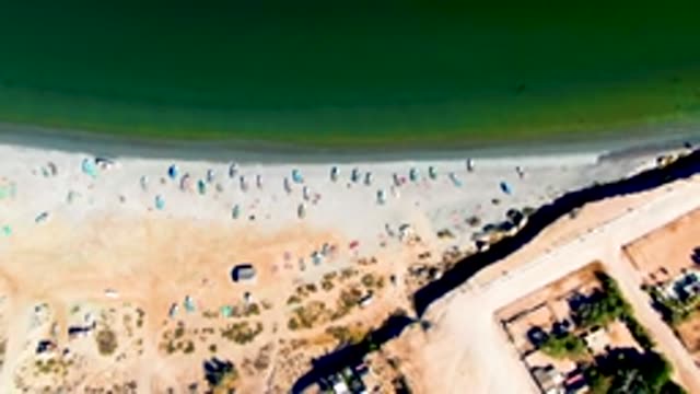 SAN JUANICO BCS MEXICO-2022: Tide Receding From Sandy Beach with Boats