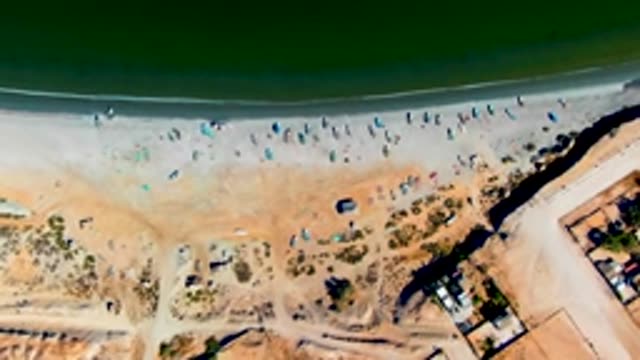 SAN JUANICO BCS MEXICO-2022: Beachgoers on Sandy Shore From Above