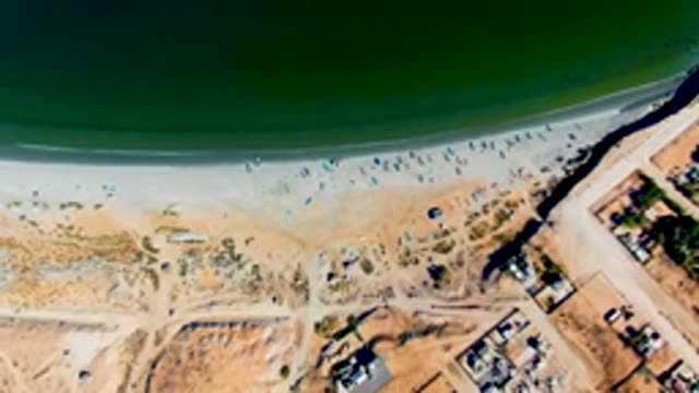 SAN JUANICO BCS MEXICO-2022: Beachgoers Gradually Leaving the Sandy Shore