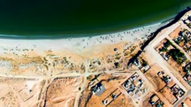 SAN JUANICO BCS MEXICO-2022: Beachgoers Gradually Leaving the Shoreline