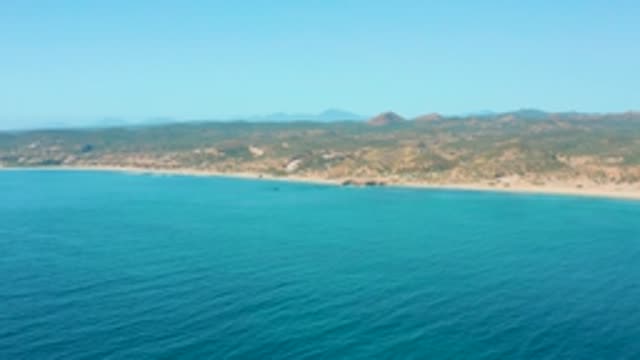EL TULE LOS CABOS BCS MEXICO-2022: Calm Ocean Meets Sandy Shore and Distant Hills