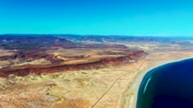 SAN JUANICO BCS MEXICO-2022: Coastal Desert Landscape with Road and Ocean