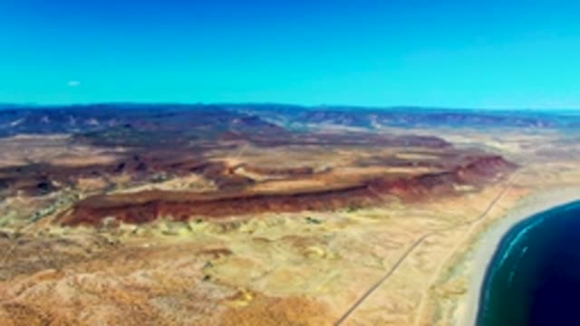 SAN JUANICO BCS MEXICO-2022: Coastal Desert Landscape with Road and Ocean