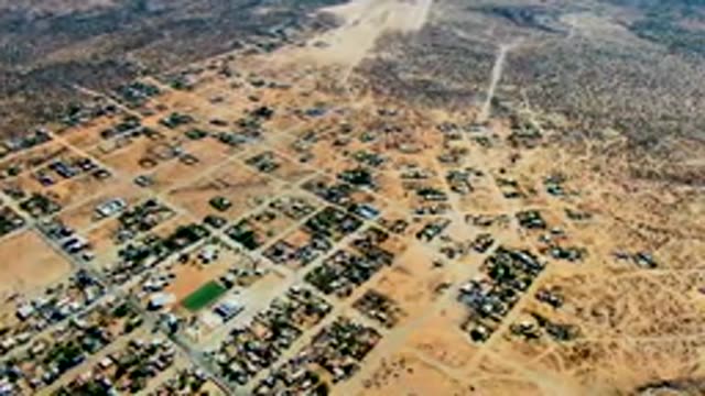 SAN JUANICO BCS MEXICO-2022: Dust Cloud Moving Over Desert Town