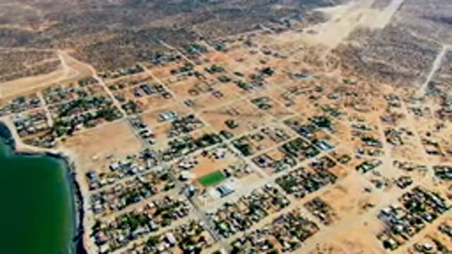 SAN JUANICO BCS MEXICO-2022: Desert Town Grid with Moving Vehicle