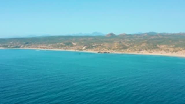 EL TULE LOS CABOS BCS MEXICO-2022: Calm Ocean Meets Sandy Shore and Distant Hills