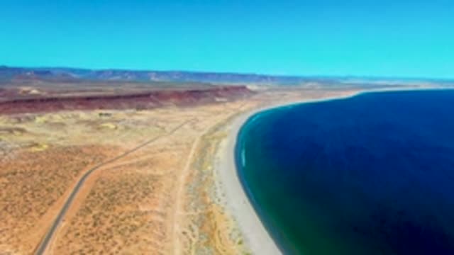 SAN JUANICO BCS MEXICO-2022: Coastal Desert Road Parallel to Sandy Shore