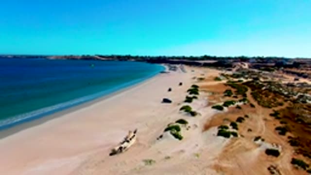 SAN JUANICO BCS MEXICO-2022: Sandy Beach with Ocean and Dune Vegetation