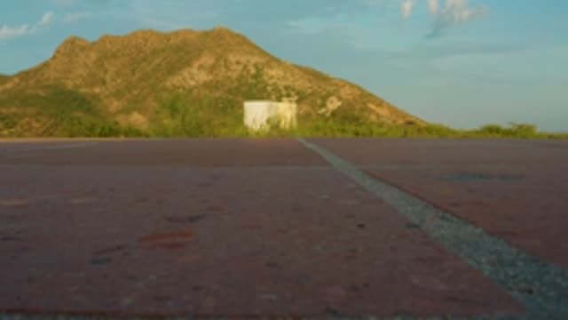 CABO PULMO LOS CABOS BCS MEXICO-2022: Road Stretching Toward Mountain and Small Structure
