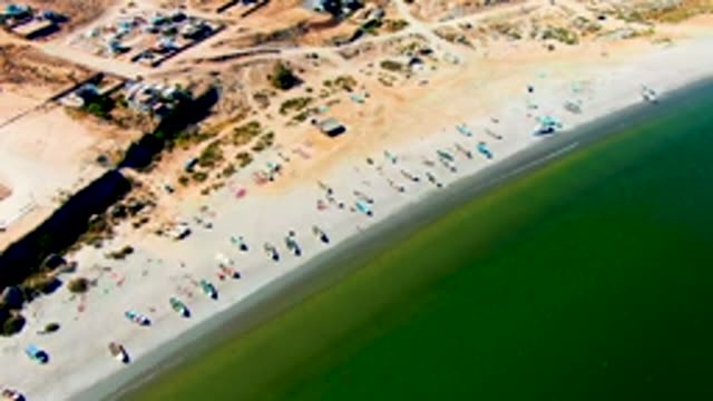 SAN JUANICO BCS MEXICO-2022: Beach with Boats and Coastal Settlement