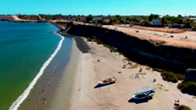 SAN JUANICO BCS MEXICO-2022: Beach with Shifting Waves and Moving Boats
