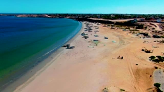 SAN JUANICO BCS MEXICO-2022: Gentle Waves Rolling Onto Sandy Beach