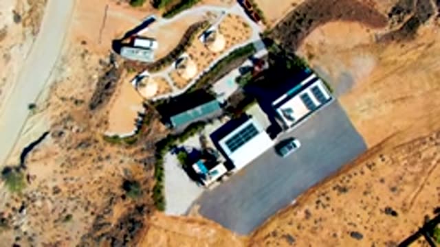 SAN JUANICO BCS MEXICO-2022: Desert Property with Car Driving Off Road