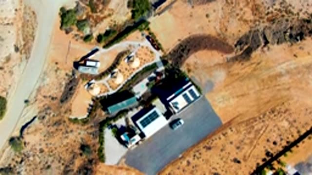 SAN JUANICO BCS MEXICO-2022: Desert Building and Road with Shifting Greenery