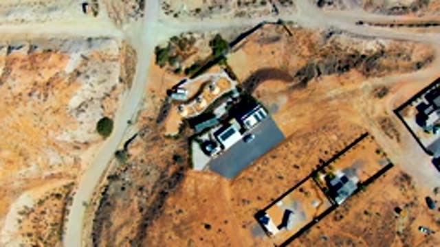 SAN JUANICO BCS MEXICO-2022: Vehicle Moving on Construction Site Dirt Road