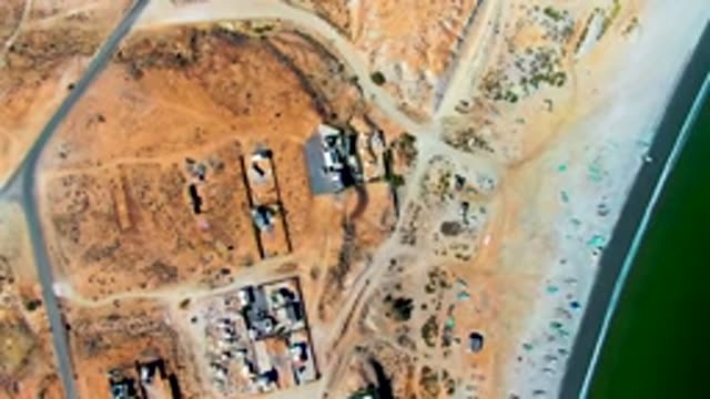 SAN JUANICO BCS MEXICO-2022: Construction Site Adjacent to Green Water