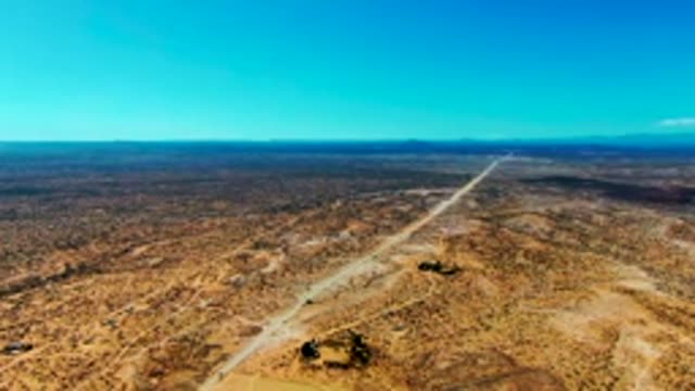 SAN JUANICO BCS MEXICO-2022: Desert Highway with Small Building From Above