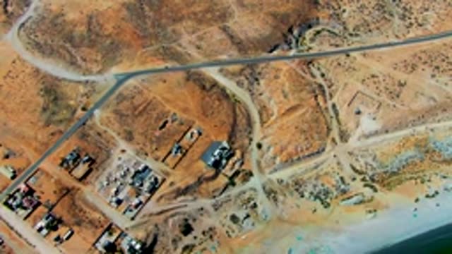 SAN JUANICO BCS MEXICO-2022: Desert Construction Site with Road and Structures Vanishing