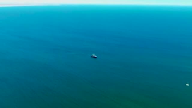 SAN JUANICO BCS MEXICO-2022: Boat Moving Across Calm Ocean Waters