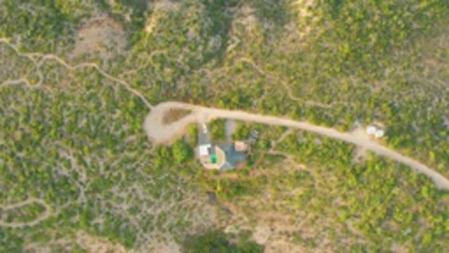 CABO PULMO LOS CABOS BCS MEXICO-2022: Person Walking near House in Hilly Landscape