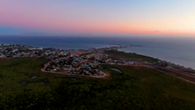 SAN CARLOS BCS MEXICO-2022: Coastal Town Dusk with Winding Road and Ocean