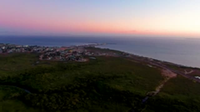 SAN CARLOS BCS MEXICO-2022: Dusk Over Coastal Village and Ocean