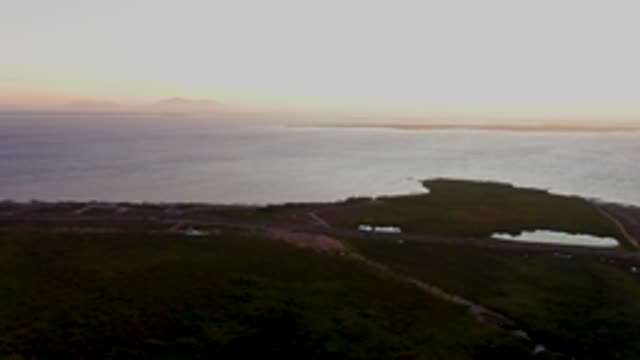 SAN CARLOS BCS MEXICO-2022: Coastal Road with Moving Vehicle at Dusk