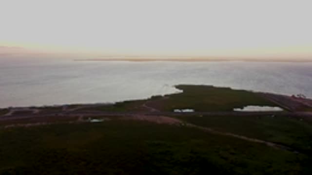 SAN CARLOS BCS MEXICO-2022: Coastal Road with Moving Vehicle at Dusk