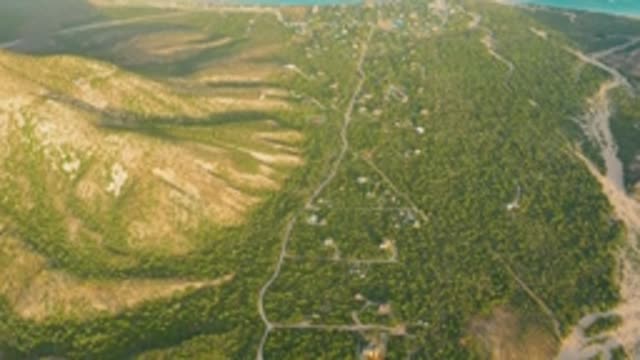CABO PULMO LOS CABOS BCS MEXICO-2022: Hilly Area with Small Settlement and Forested Hills