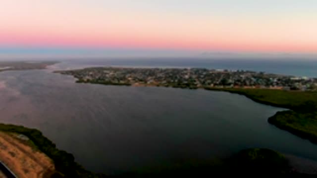SAN CARLOS BCS MEXICO-2022: Coastal Town at Dusk with Bay and Ocean