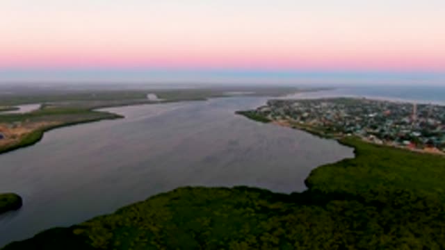 SAN CARLOS BCS MEXICO-2022: River Estuary Dusk with Town and Forest