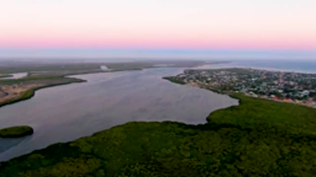 SAN CARLOS BCS MEXICO-2022: Rippling Estuary Beside Coastal Town at Twilight