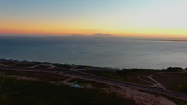SAN CARLOS BCS MEXICO-2022: Coastal Highway at Sunset with Ocean and Dunes
