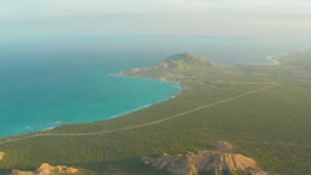 CABO PULMO LOS CABOS BCS MEXICO-2022: Coastal Road Along Turquoise Ocean and Green Hills