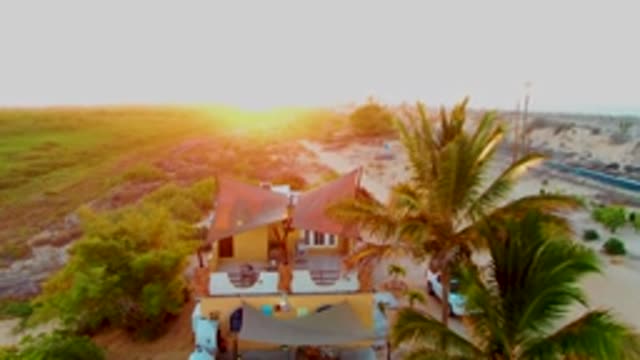 SAN CARLOS BCS MEXICO-2022: Beach House and Palm Trees During Sunset