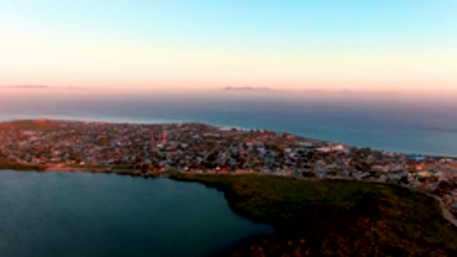 SAN CARLOS BCS MEXICO-2022: Coastal Town at Dusk with City Lights