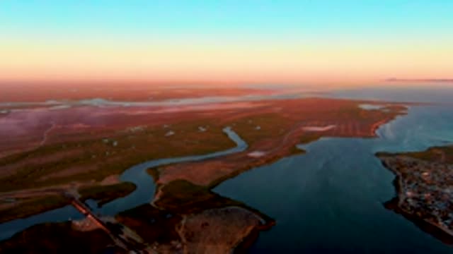 SAN CARLOS BCS MEXICO-2022: Coastal Waterway Flowing at Dusk