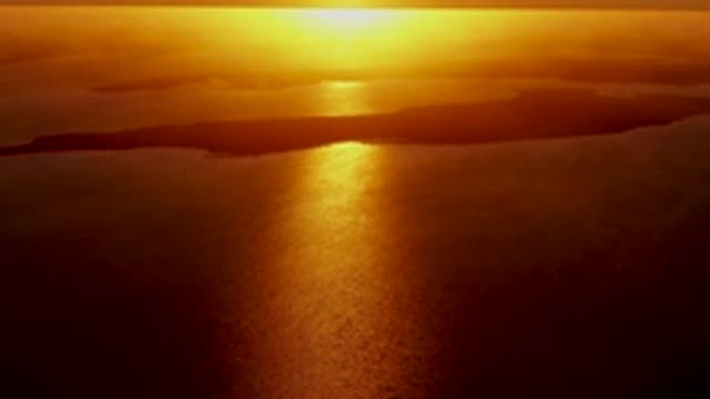 SAN CARLOS BCS MEXICO-2022: Golden Sunset Reflection on Calm Ocean Waters