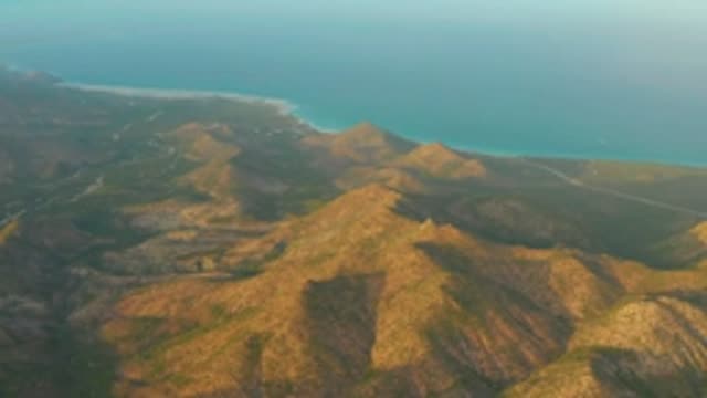 CABO PULMO LOS CABOS BCS MEXICO-2022: Coastal Mountain Ridges and Ocean Horizon