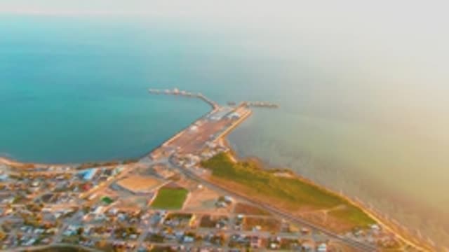 SAN CARLOS BCS MEXICO-2022: Coastal Town and Pier in Descending Aerial View