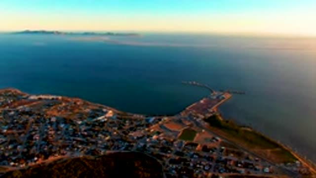 SAN CARLOS BCS MEXICO-2022: Coastal Town at Sunset with Ocean and Distant Islands