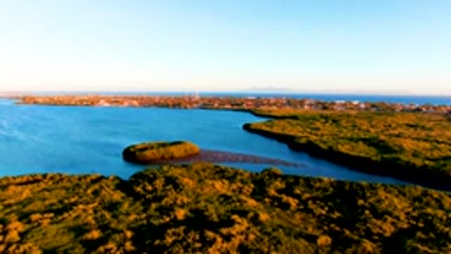 SAN CARLOS BCS MEXICO-2022: Calm Bay and Coastal Town with Gentle Water Ripples