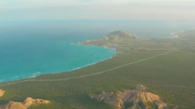 CABO PULMO LOS CABOS BCS MEXICO-2022: Coastal Road Along Turquoise Ocean and Green Hills