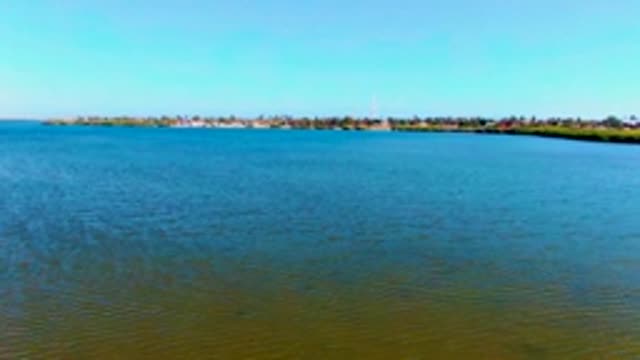 SAN CARLOS BCS MEXICO-2022: Calm Water with Distant Shoreline and Gentle Ripples