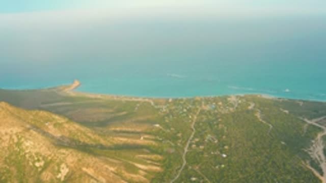 CABO PULMO LOS CABOS BCS MEXICO-2022: Coastal Hillside and Ocean with Shifting Shadows