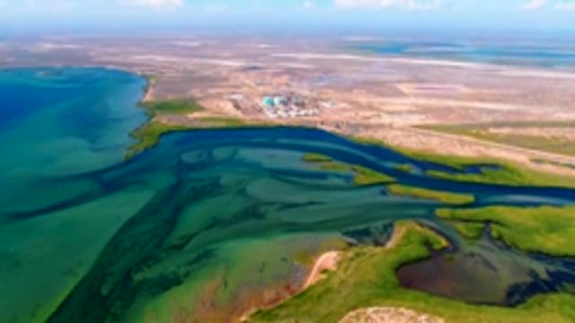 SAN CARLOS BCS MEXICO-2022: Coastal Wetland and Industrial Site Under Changing Sky